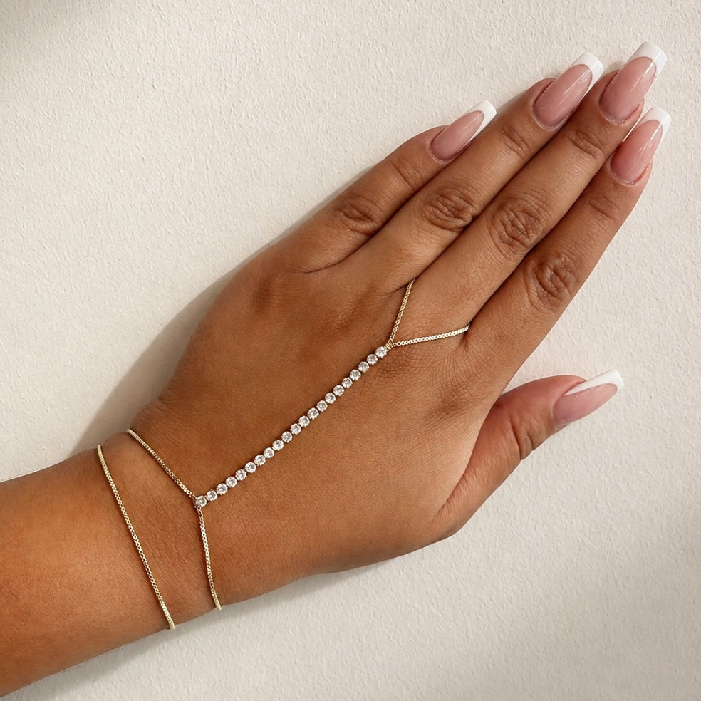 Pulsera conectada a dedo zircones