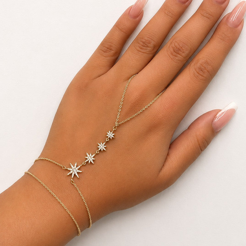 Pulsera conectada a dedo estrellas