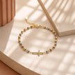 Pulsera 3 oros cruz