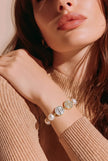 Pulsera perla dije religioso 2 oros