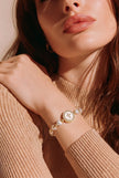 Pulsera perla dije nacar cruz