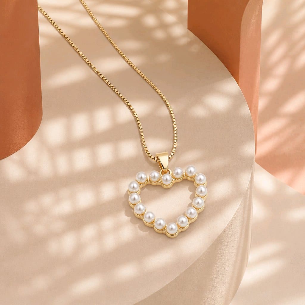 Collar rodio silueta corazon perlas