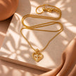 Collar rodio corazón cruz