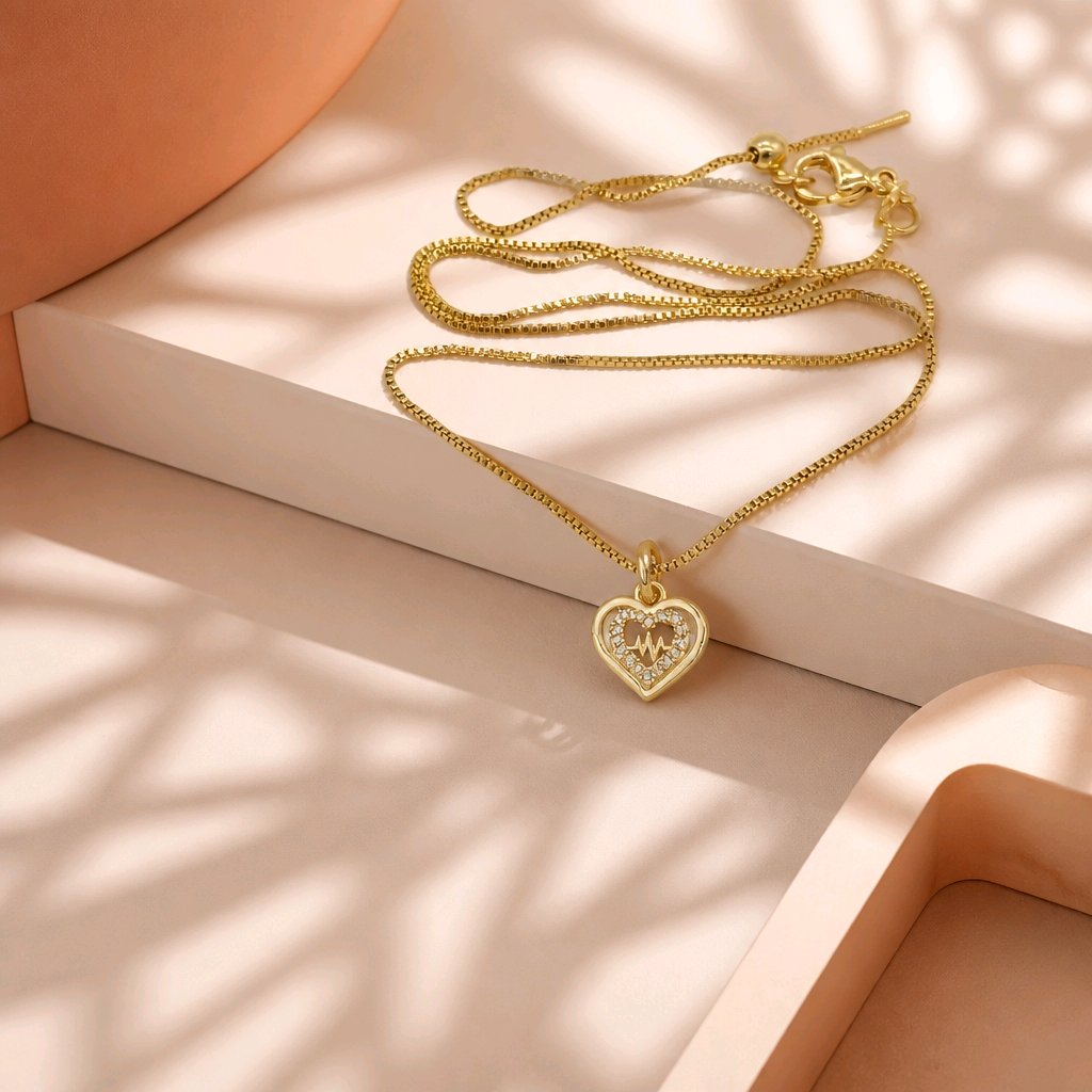 Collar rodio corazón ondas