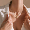 Collar rodio cruz corazón