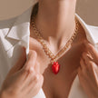 Collar rodio corazón tusa