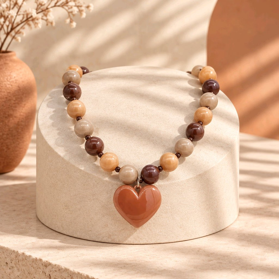 Collar rodio café corazón acre