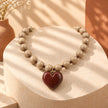 Collar rodio café corazón marrón