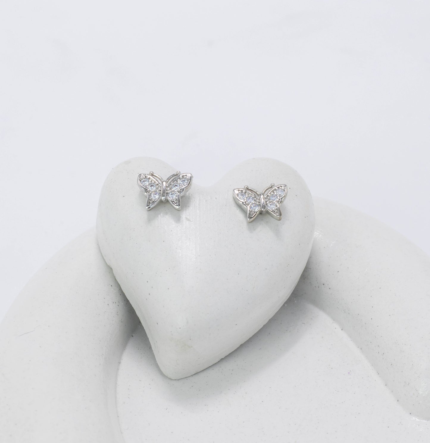 Topo mariposa microzircones P