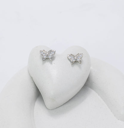 Topo mariposa microzircones P