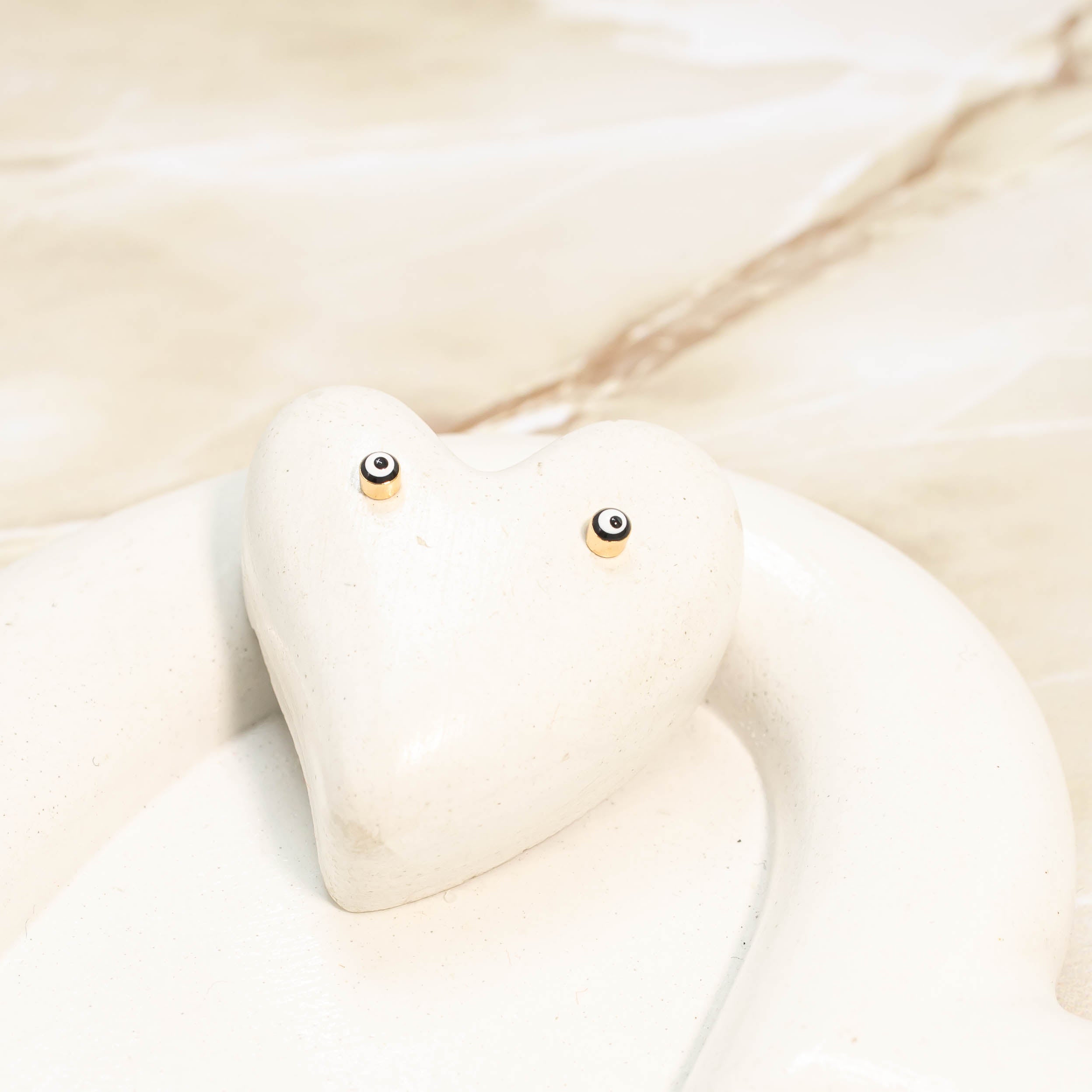 Topo ojo turco negro